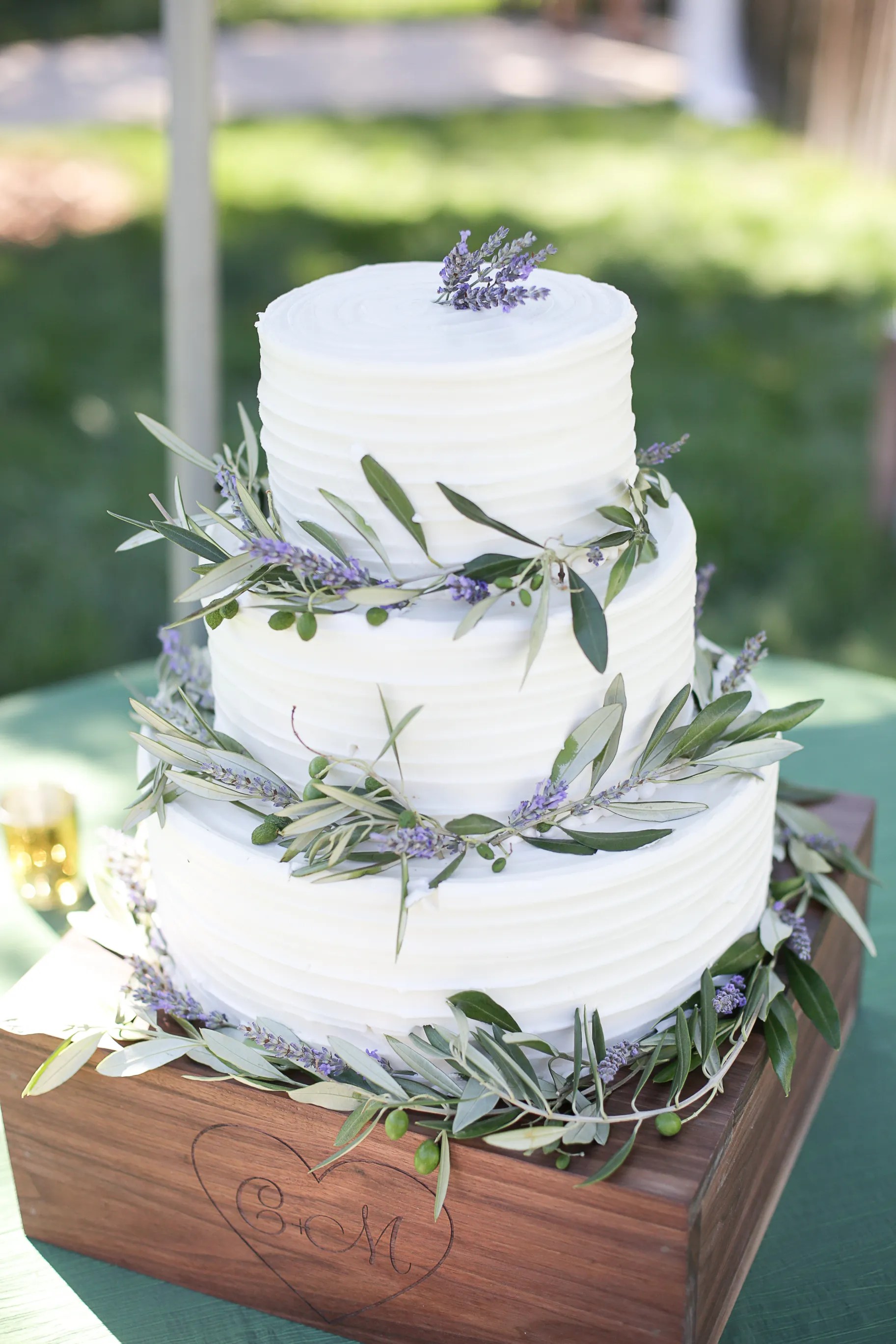 Photos + reception all on site, as well as having accommodation onsite and plenty more nearby. Lavender and Olive Leaf Wedding Cake