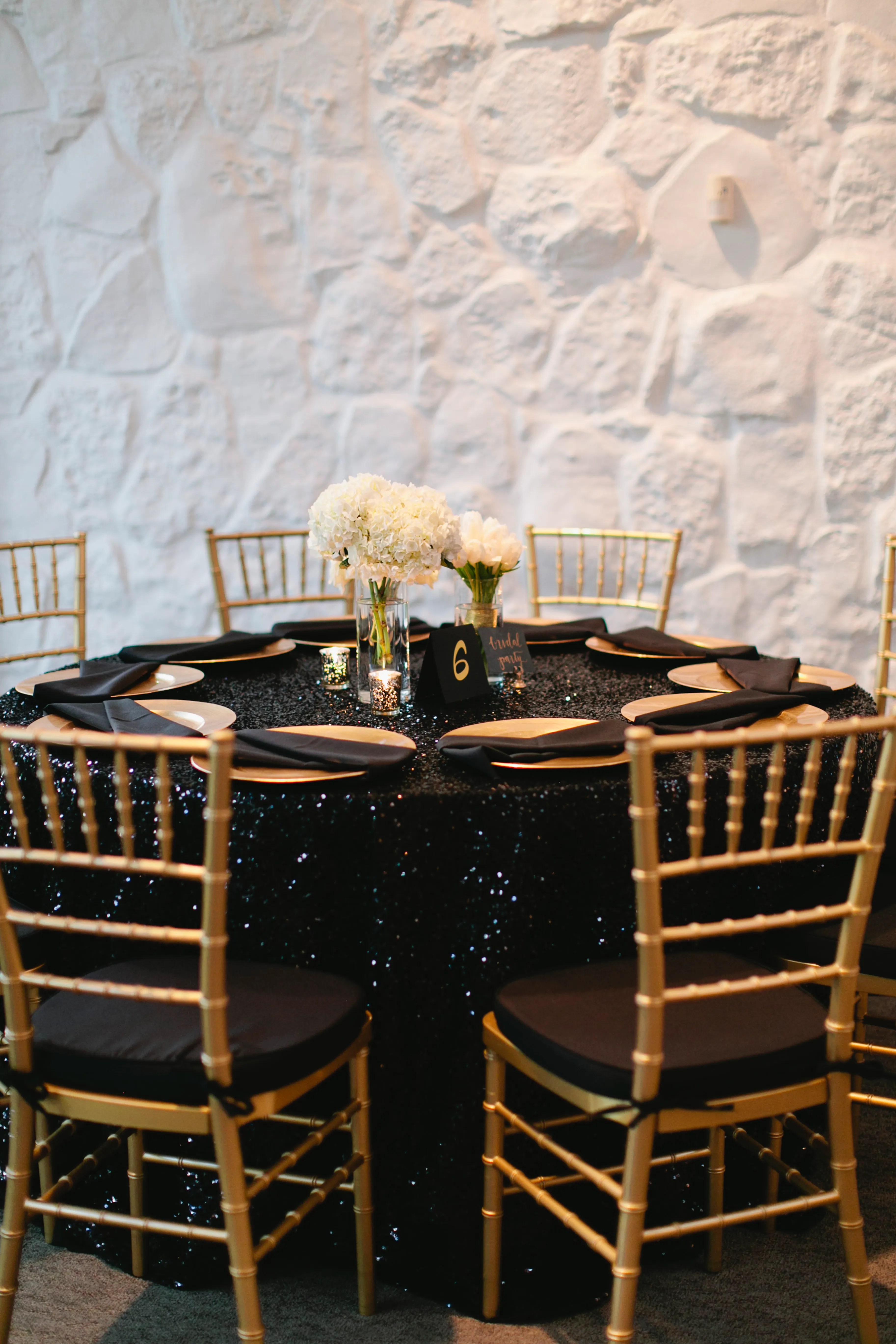 Laprong jewelers specializes in custom wedding & engagement rings. Black-Sequined Dining Table With Gold Chiavari Chairs