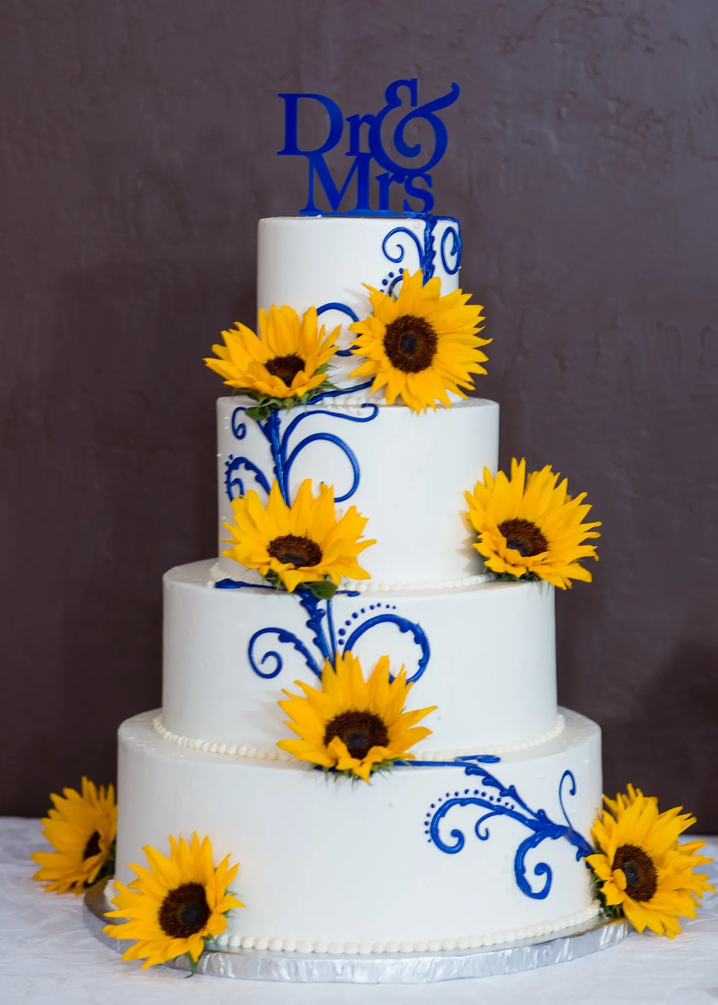 And, in there adorable white dresses, sometime. White and Blue Wedding Cake with Sunflowers and Custom