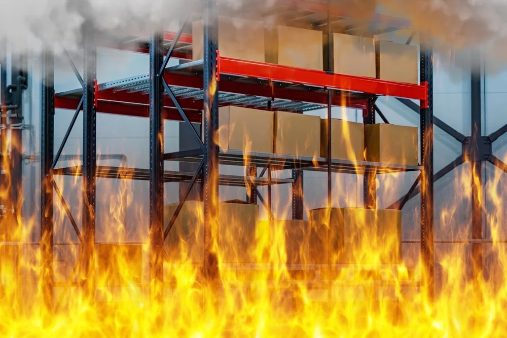 fire in warehouse causing damage