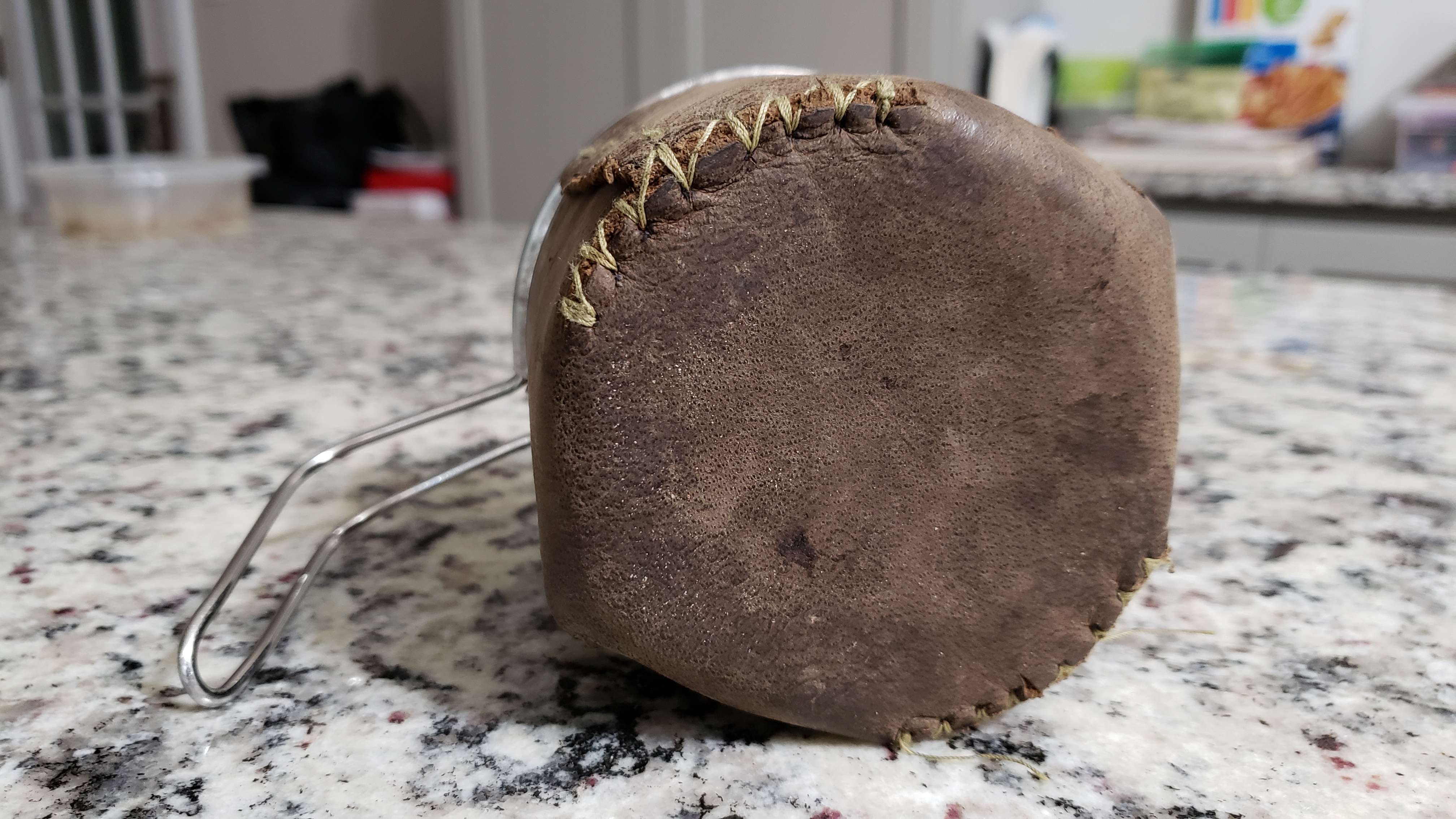 Bottom view showing the edge seam stitching.