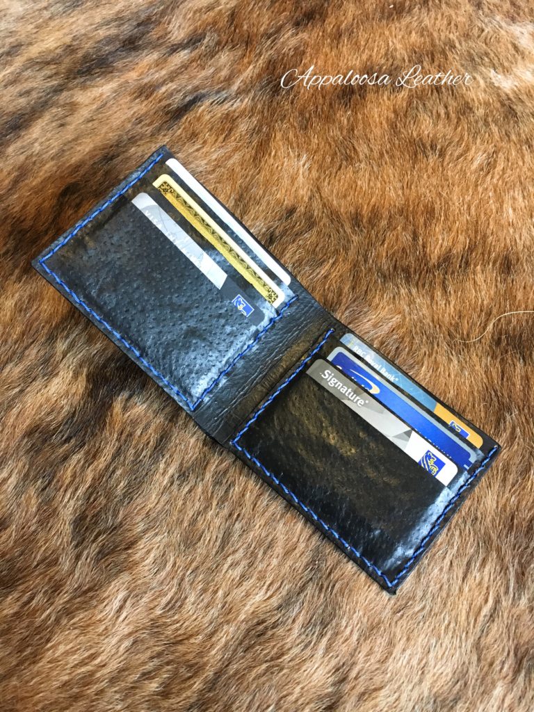 Black leather men's wallet with blue stitching