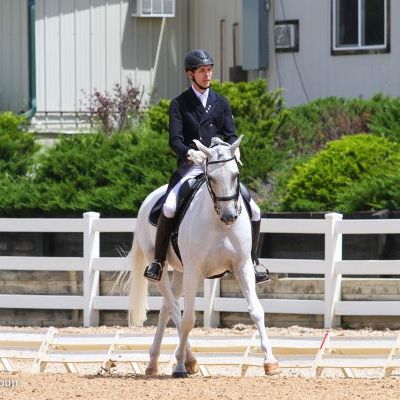 Allen Swafford riding a white horse
