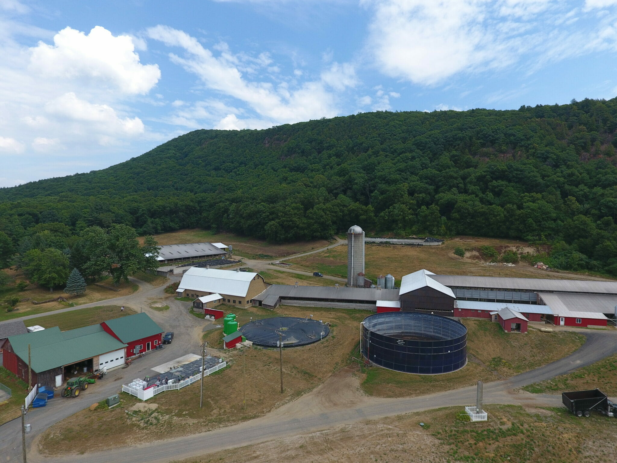 A biodigester under construction on a farm.