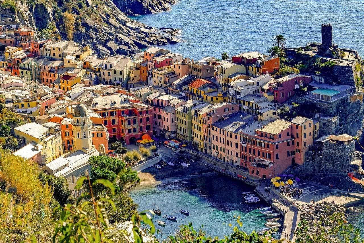 Colourful buildings overlooking Vernazza harbour in Cinque Terre on the Ligurian coast of Italy.