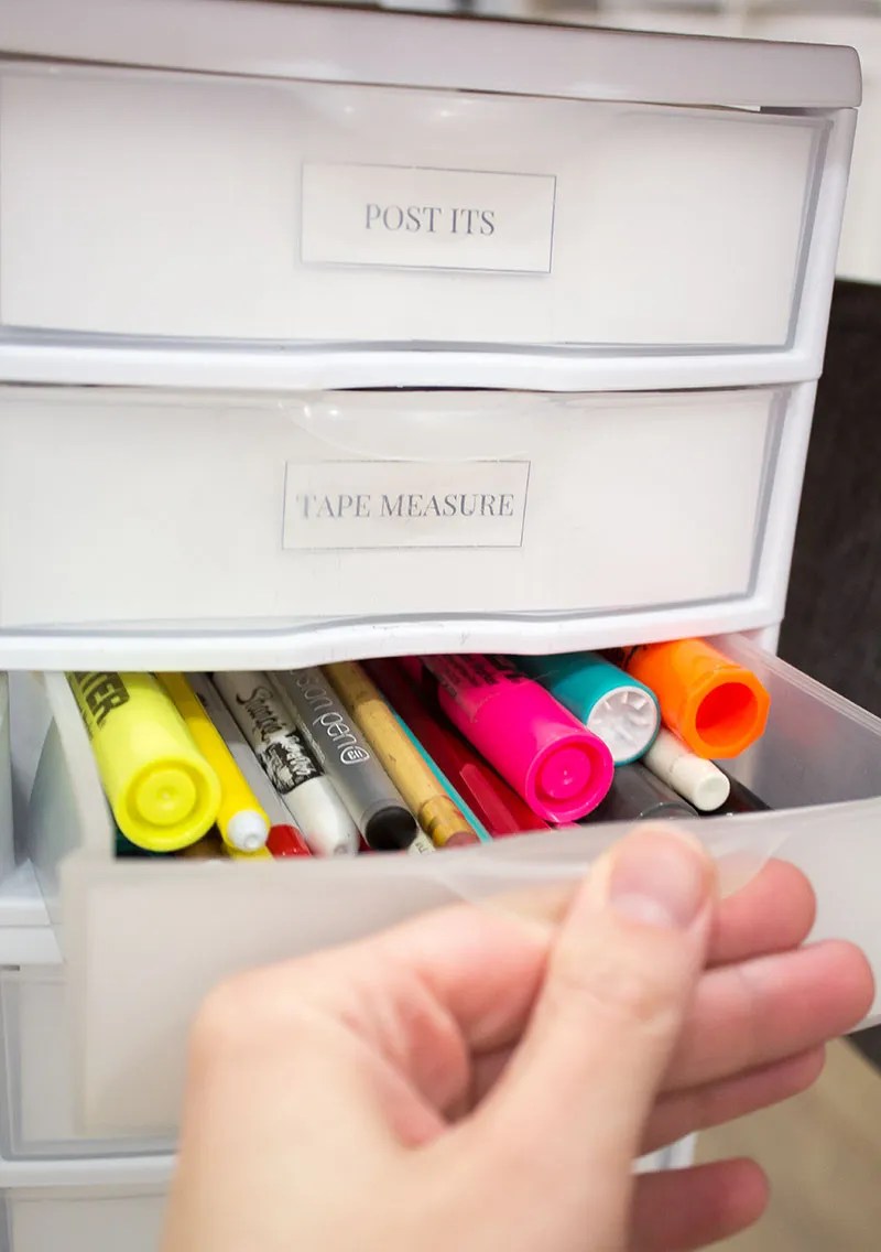 Struggling to stay productive in a cramped workspace? See exactly how I organize a small desk with no drawers to manage THREE jobs - including these plastic drawers - without clutter. From stackable bins to hidden cord control, this real-life setup will inspire your next desk makeover. #workspacegoals #minimalistdesk #desksetupideas #homeofficeorganization #smallspacesolutions