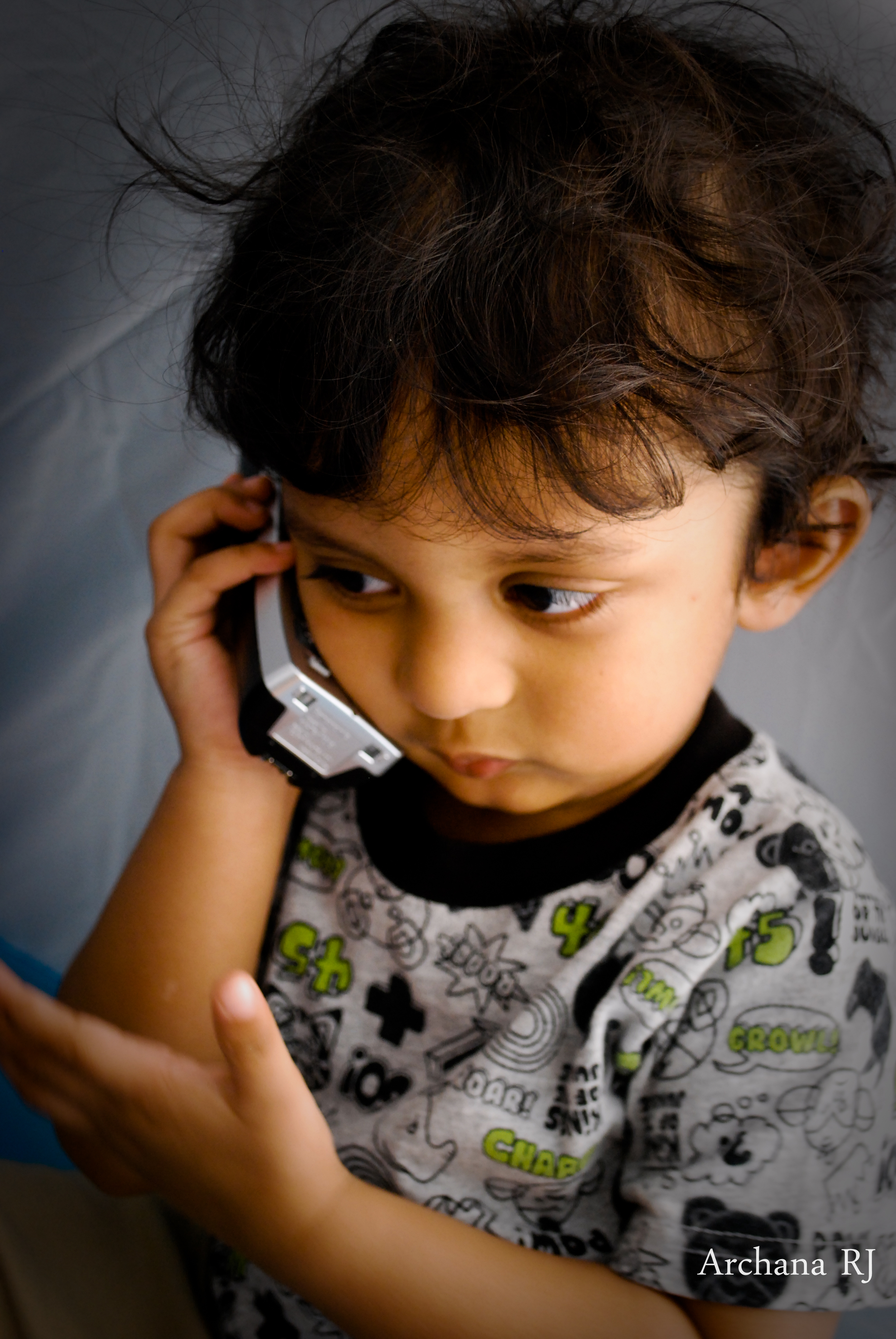 kid talking on phone