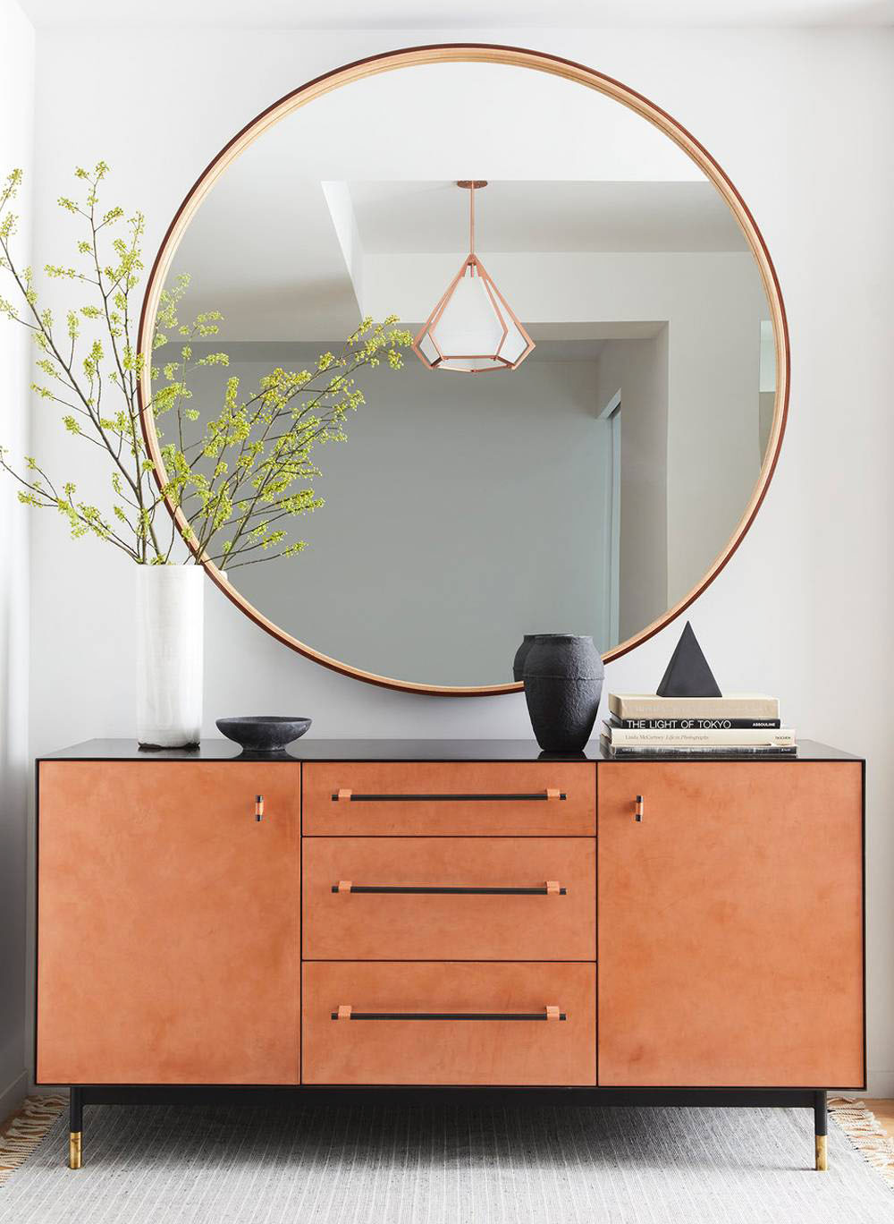Place a Mirror Hung on The Wall to Complete Your Entryway Table