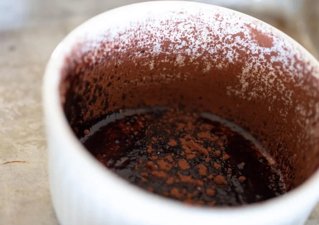 Cocoa powder dusted ramekin.
