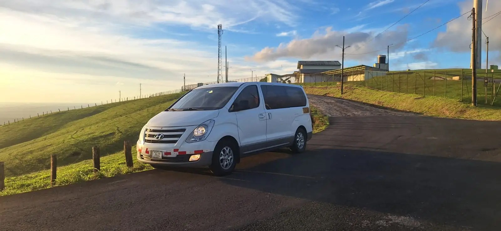 Private transportation van traveling through Costa Rica with travelers enjoying a comfortable road trip
