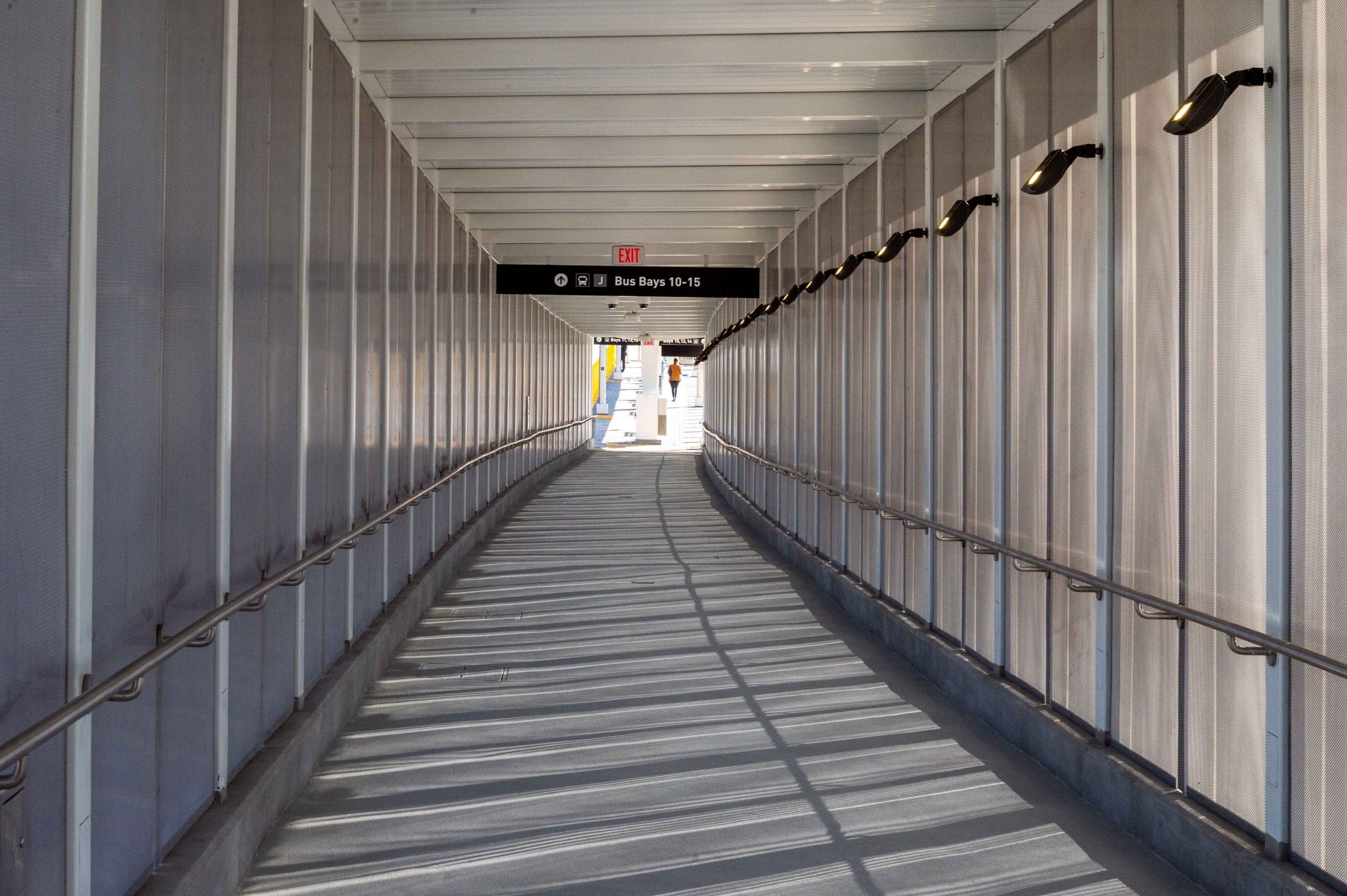 Wind Bridge is a system of integrated metal panels along the pedestrian bridge connecting a new busway station to Union Station and Patsaouras Transit Plaza.