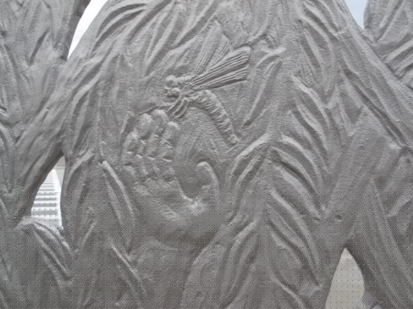 Detail of Paraje—Spanish for a resting place between two destinations—a 10ft h x 10ft w cast stainless steel sculpture containing imagery inspired by the nearby Gardena Willows Wetlands. Preserve.
