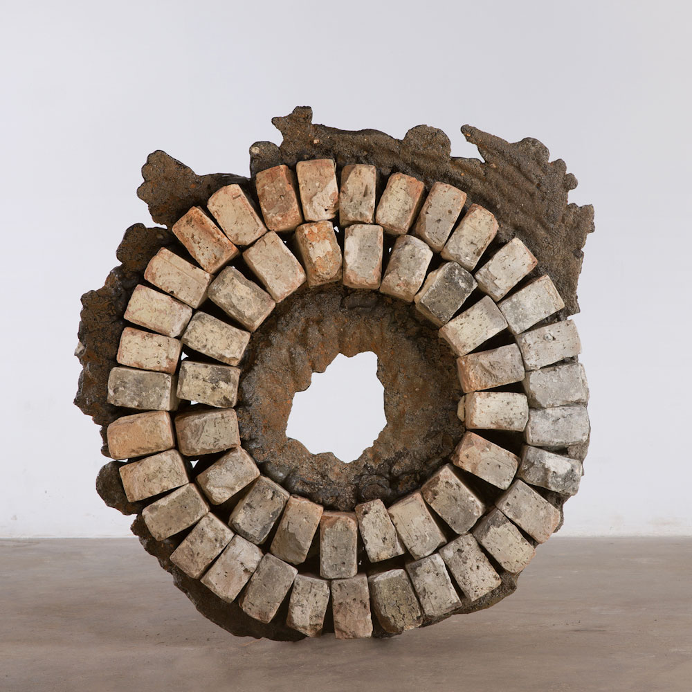 burnt Chicago brick. 40” H x 40”W x 8”D. 2015.