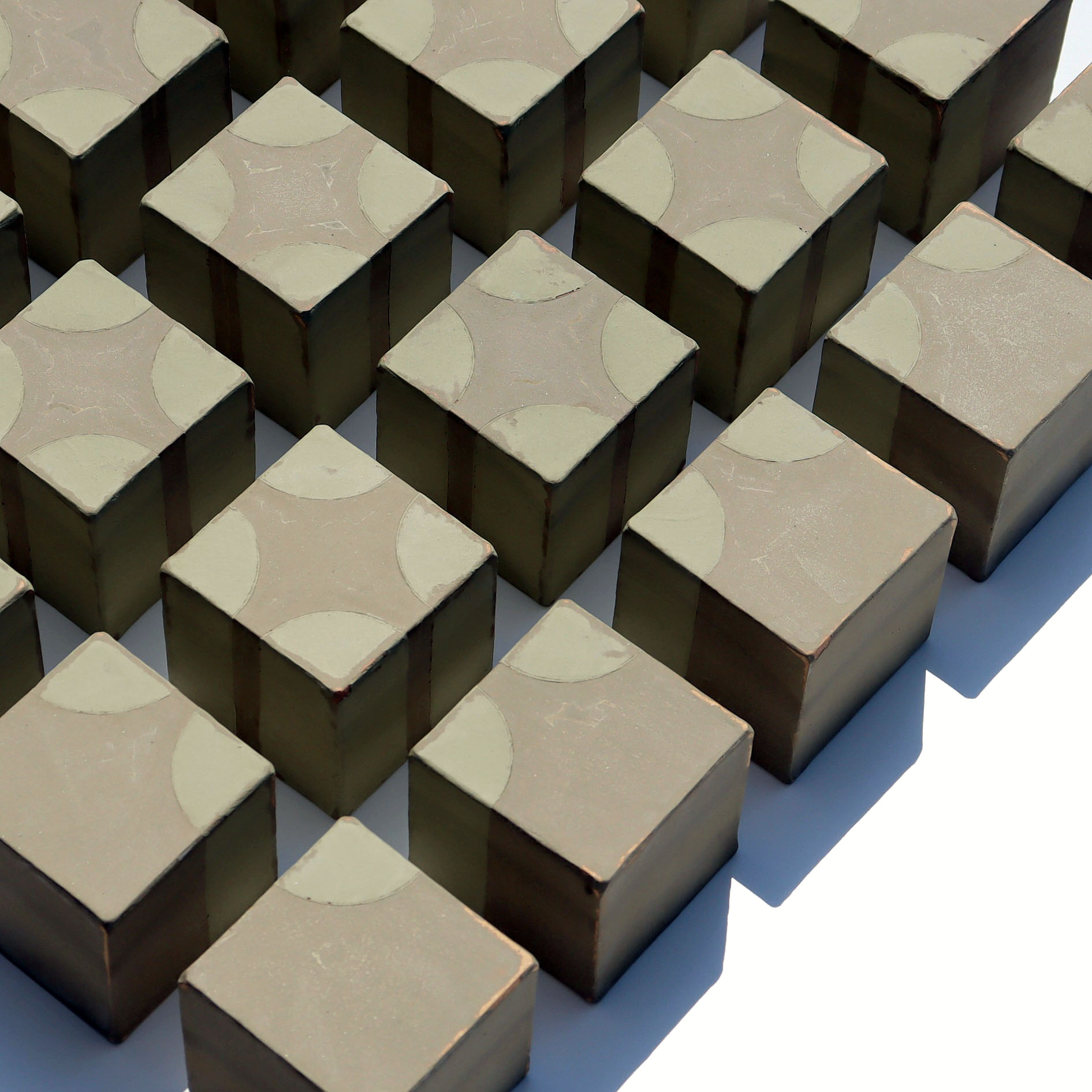 Wall-hung, composed of 25 individual stoneware cubes, each about 3" x 3" x 3".