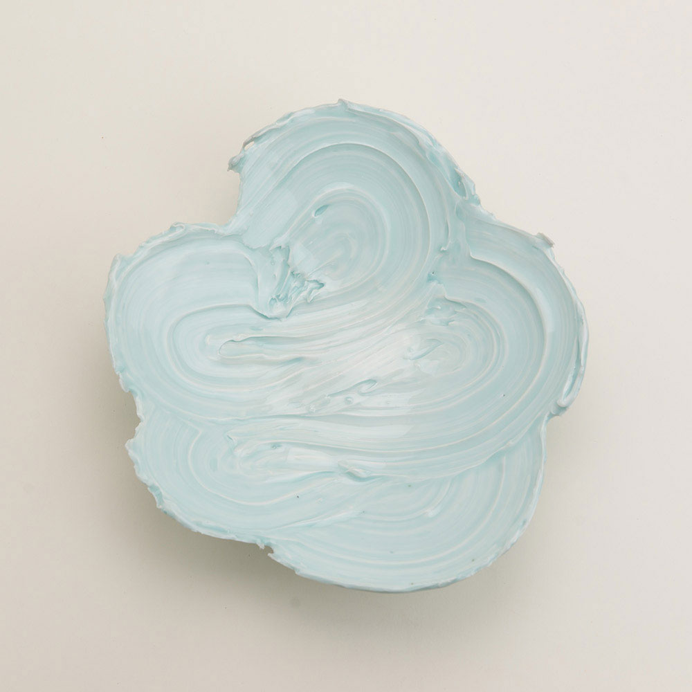 Thrown porcelain with painted slip decoration and celadon glaze, reduction cone 10. 2016.