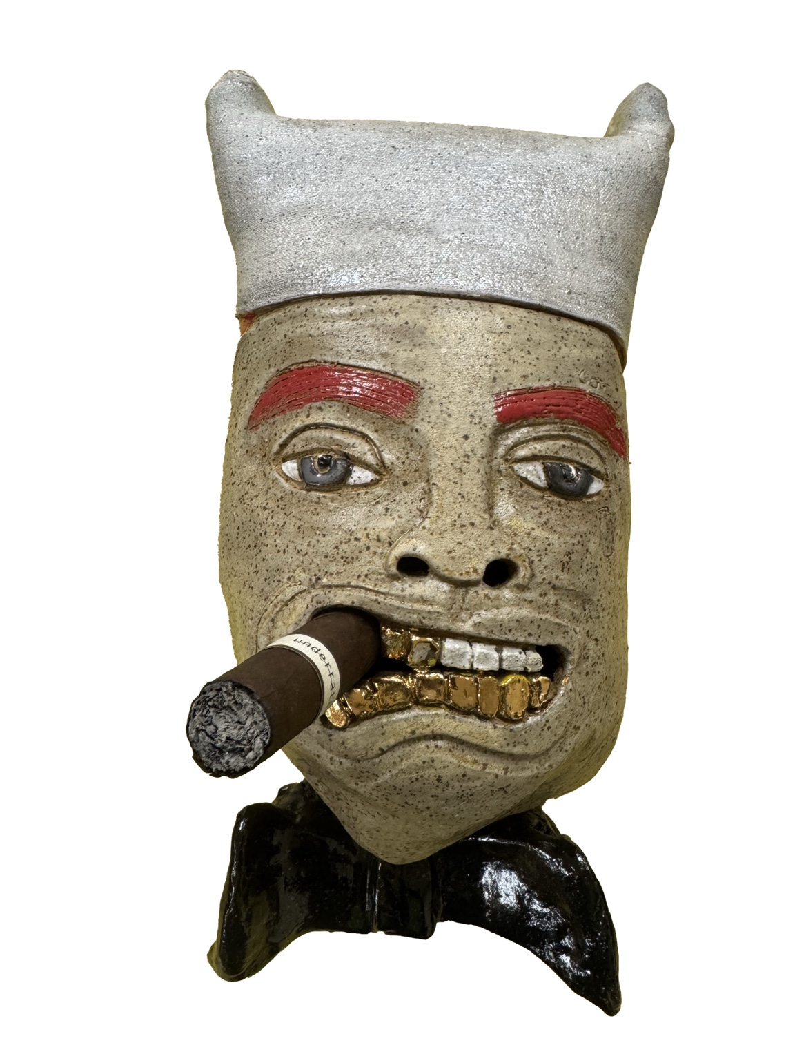 The Milk Man ceramic sculpture by Gary Gee, with a speckled stoneware face, silver crown, red eyebrows, gold teeth and a cigar.