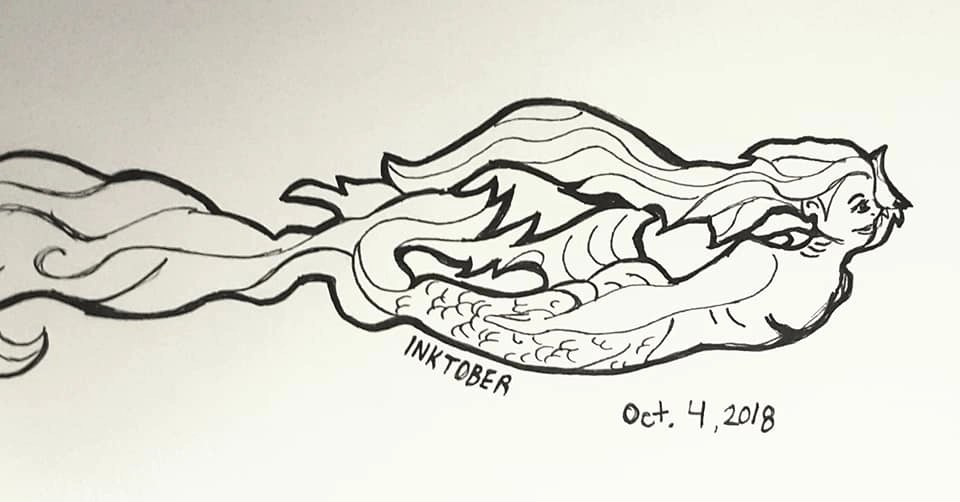 Mermaid creature swimming