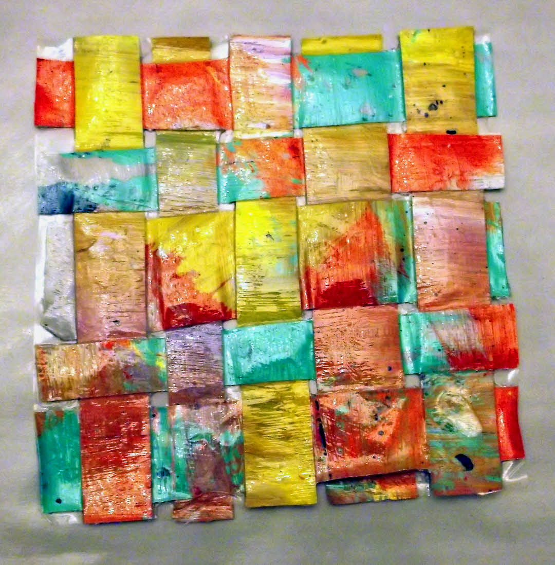 Strips of acrylic skins weaved together