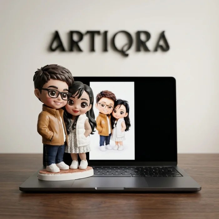 Cute personalized chibi couple figurine by ARTIQRA UAE, custom cartoon mini statue from photo, unique anniversary and wedding gift idea