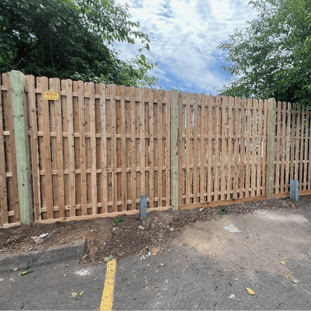 Board on board cedar wood fence built and installed by Artistic Fence Company of Passaic, New Jersey