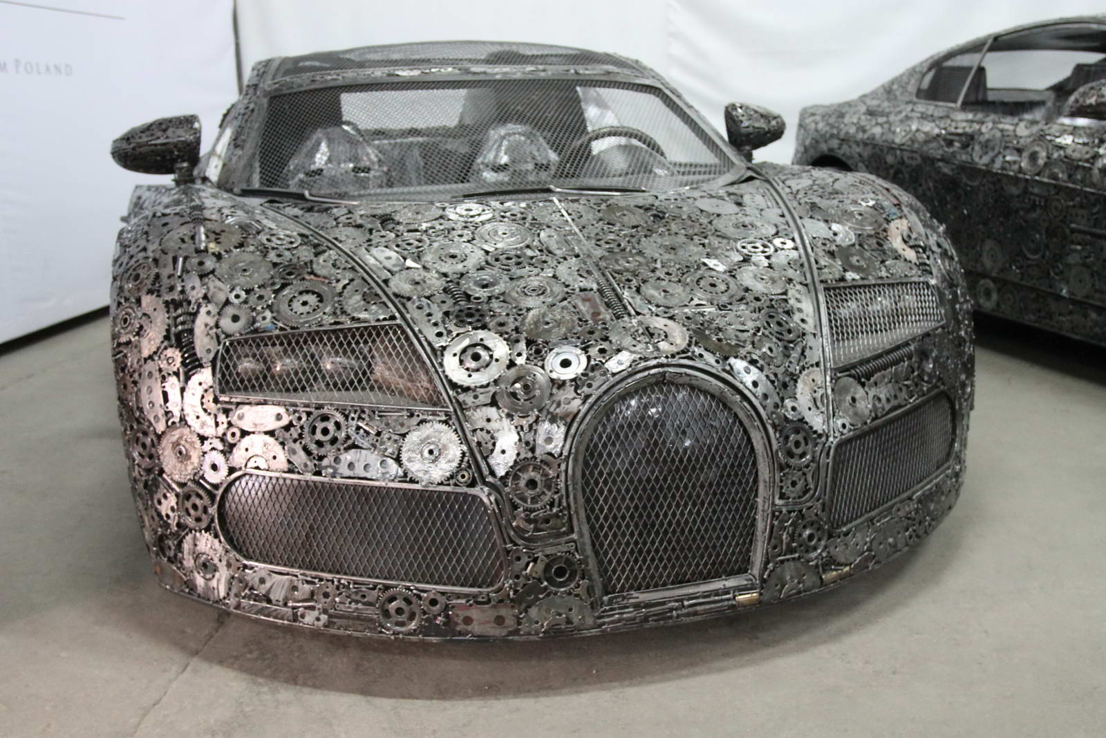 Artists Recycle Scrap Metal Into Supercars