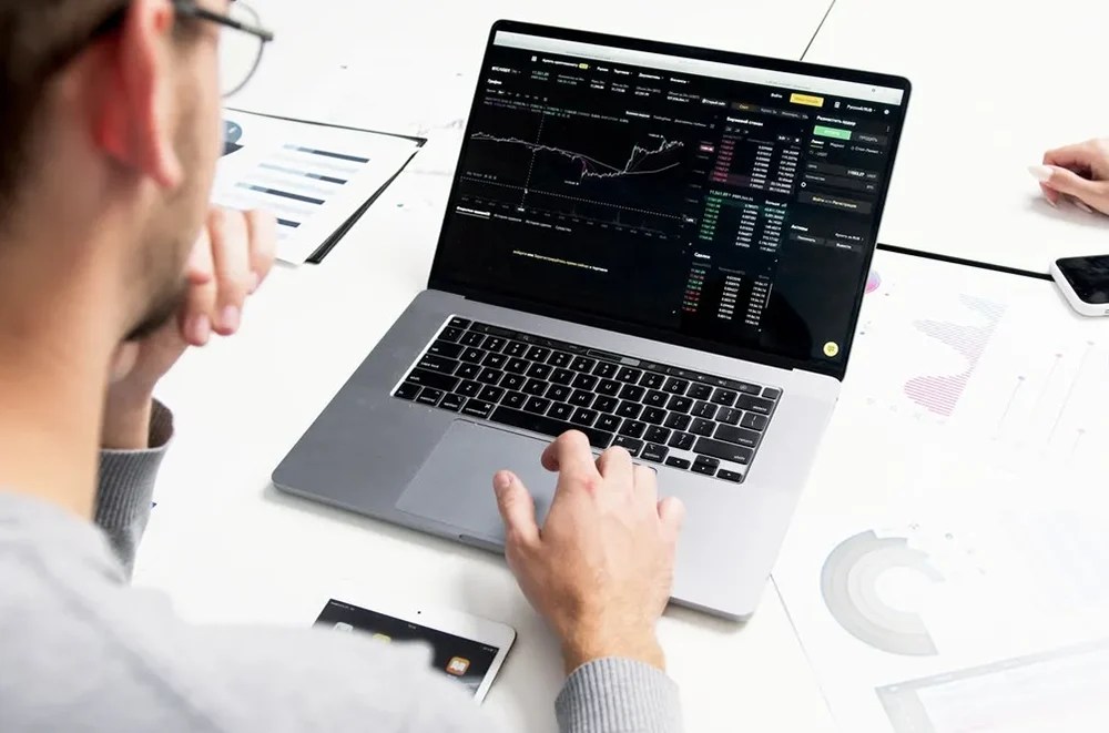 A developer using a laptop.