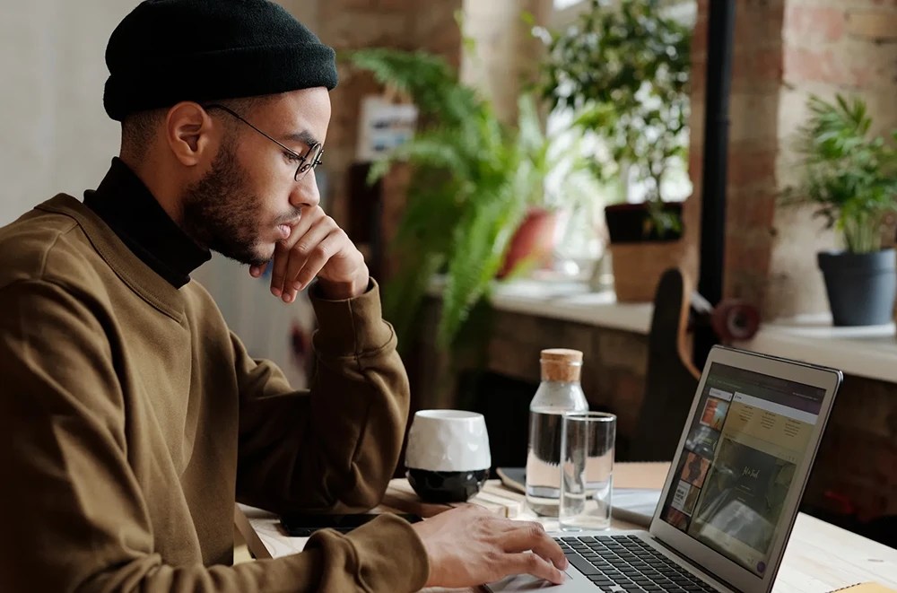 A UI designer working remote at their home office.