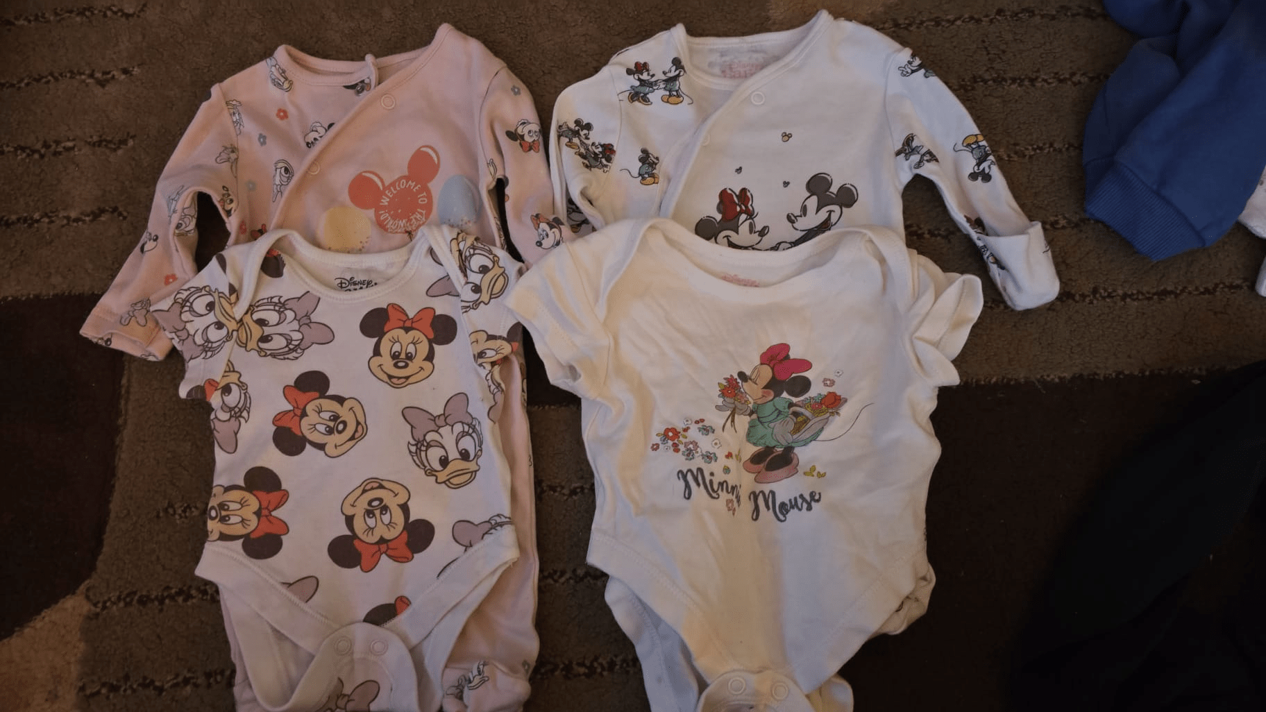 Pastel Disney baby clothes with Minnie or character details