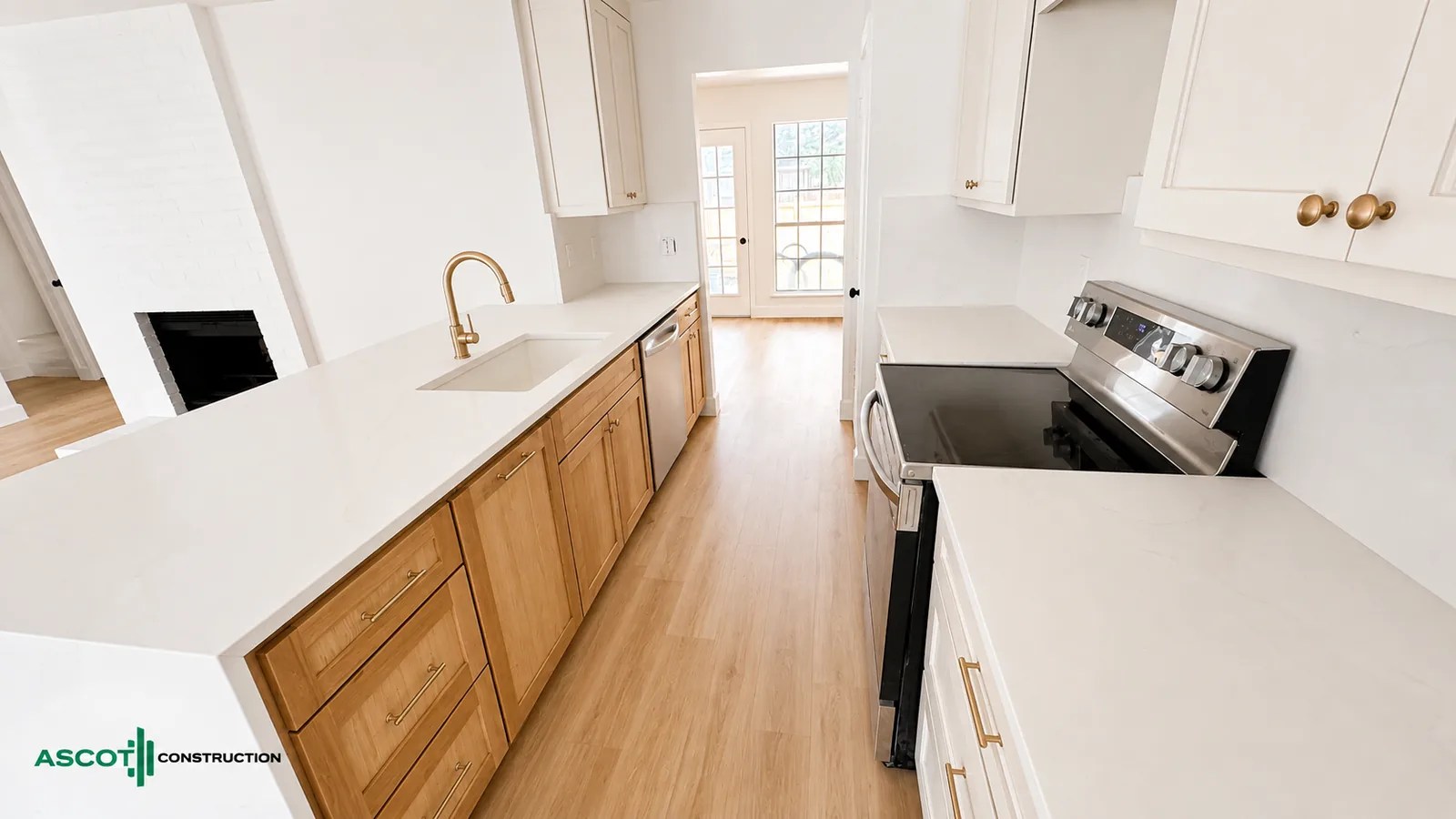 Modern kitchen remodel with white countertops and wood cabinetry in Fort Worth, TX