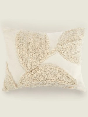 Natural carved leaf cushion