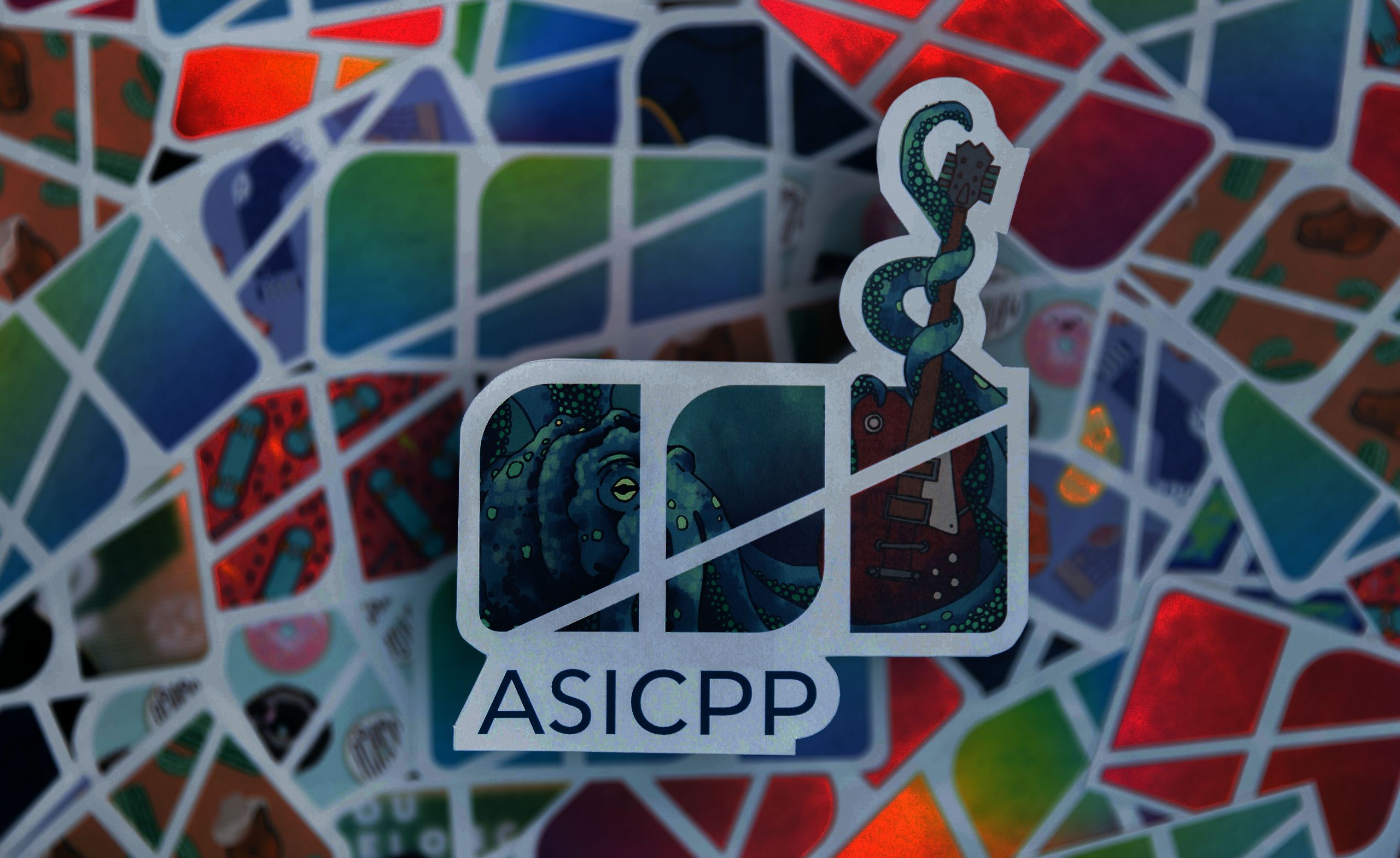 pile of various ASICPP stickers