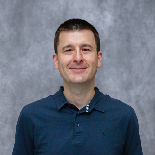Portrait of Scott Macleod in front of grey backdrop