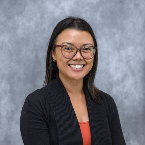 Portrait of Sharon Rocacorba in front of grey backdrop