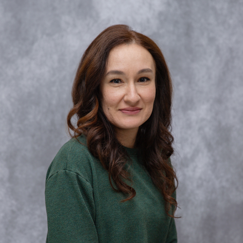 Portrait of Teresa Gonzalez in front of grey backdrop