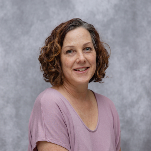 Portrait of Maria-Lisa Flemington in front of grey backdrop