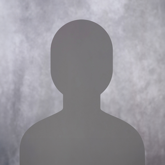 Placeholder of a person in front of grey backdrop