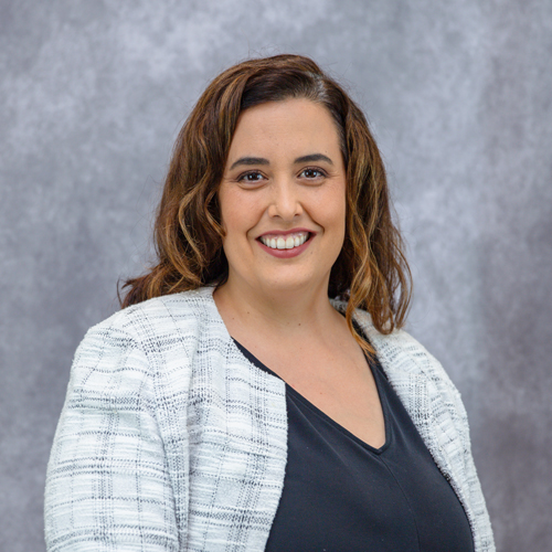 Portrait of Nicole Pargee in front of grey backdrop