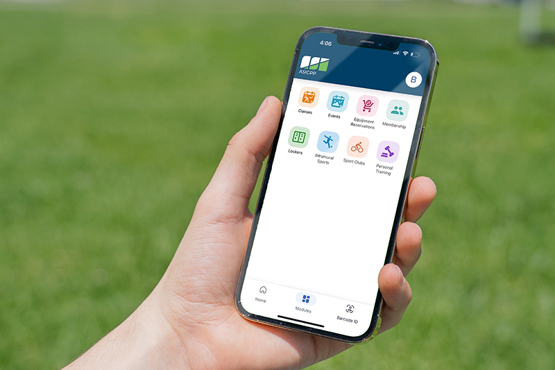Hand holding a phone with an application on screen