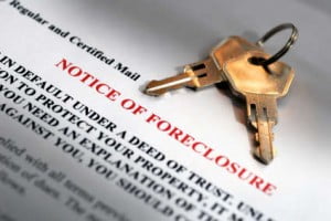 Keys placed on a document titled "Notice of Foreclosure," with highlighted text below, serve as a stark reminder. Consulting a financial planner might offer new pathways by improving credit or restructuring your budget to prevent such future challenges.