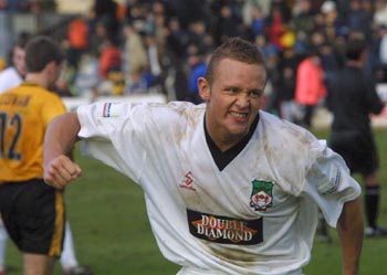 2003: Lee Trundle getsthe consolation in a 3-1 home loss to Macclesfield.