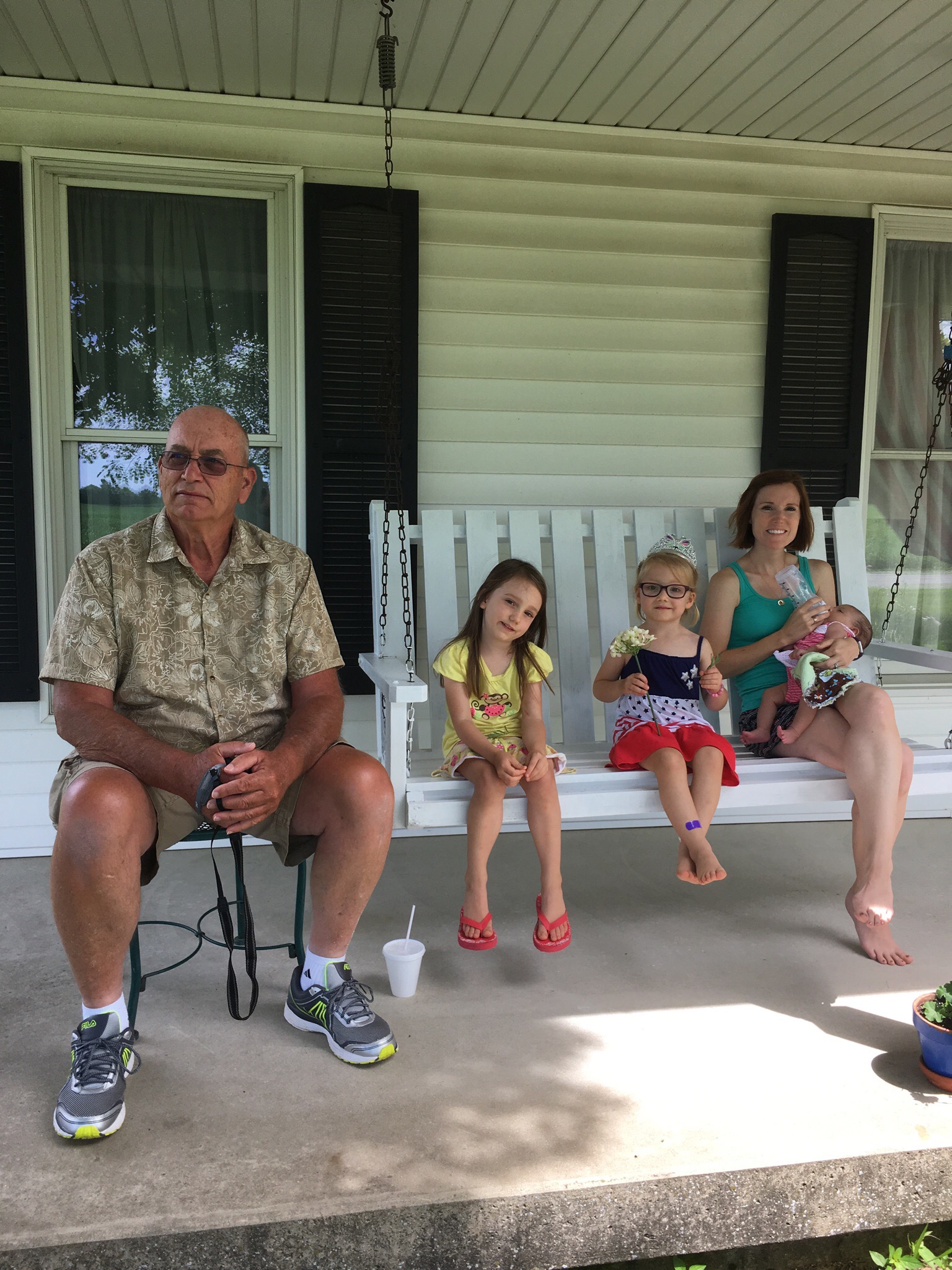 Mark, Anna, Evie, Liz, and Raena waiting for the cyclists!