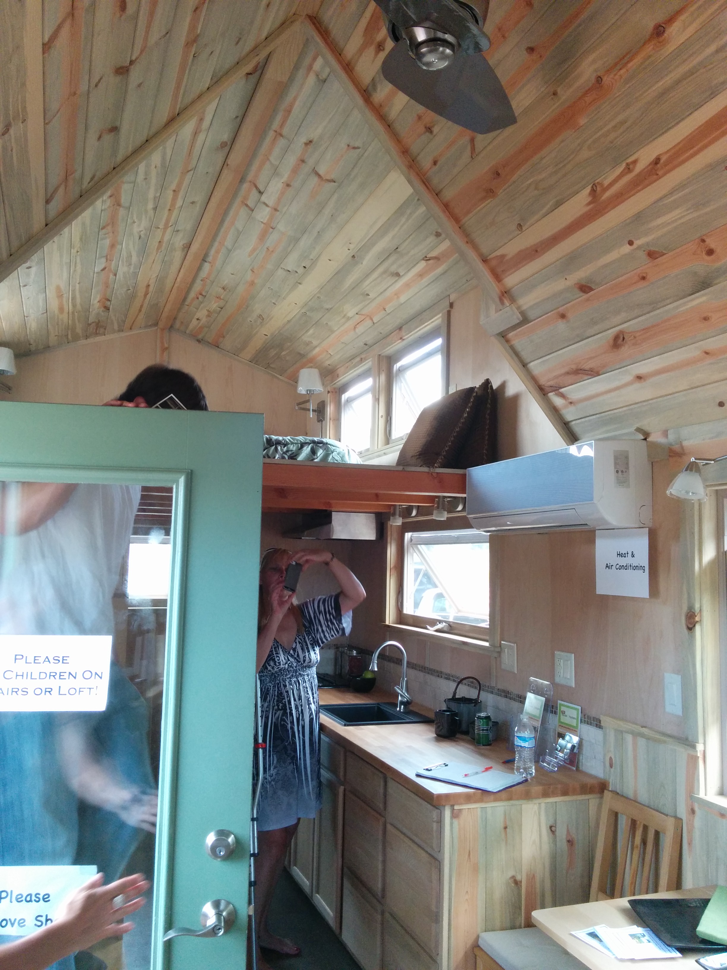 Galley kitchen opposite the stairs.