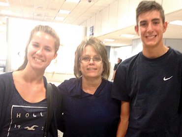 Adele Justice with the new foreign exchange students Laure Anne Bya and Diego Menendez.