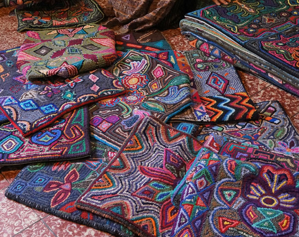 Colorful rugs hooked by the Multicolores women.