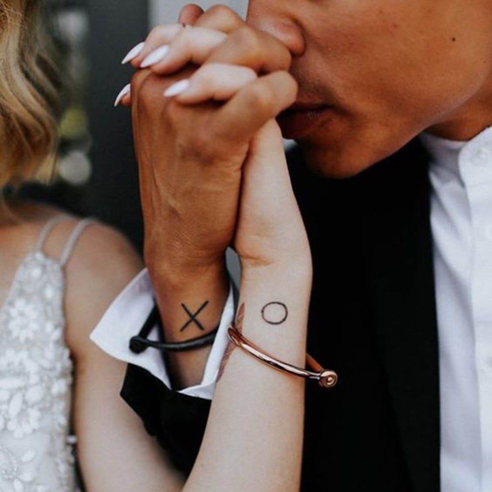 15 Couple Tattoos That Are Cooler Than Wedding Rings - Brit + Co 1000_x_1000_jpg