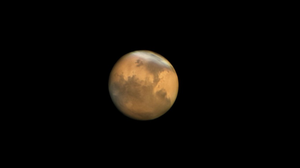 mars with clouds visible