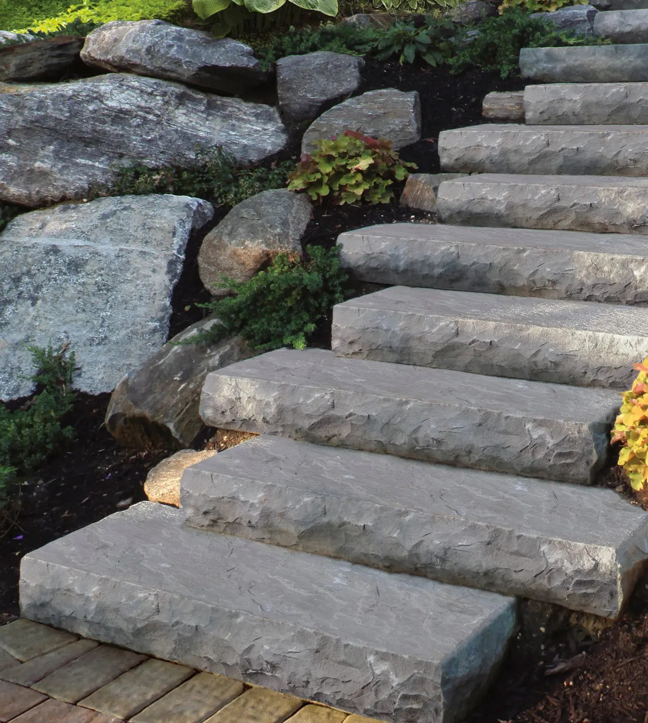 This is a great alternative for those who prefer a more modern approach to fire pits. Cambridge Natural Stone Steps