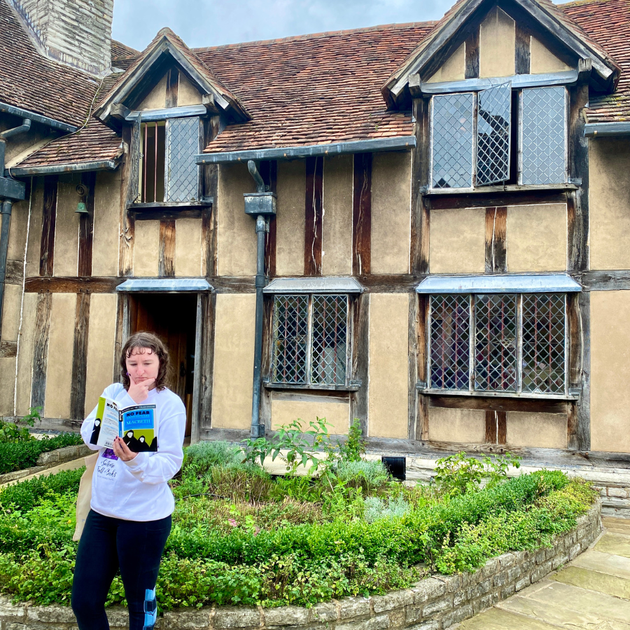 Me trying to understand Shakespeare- frowning at a book outside his Birthplace
