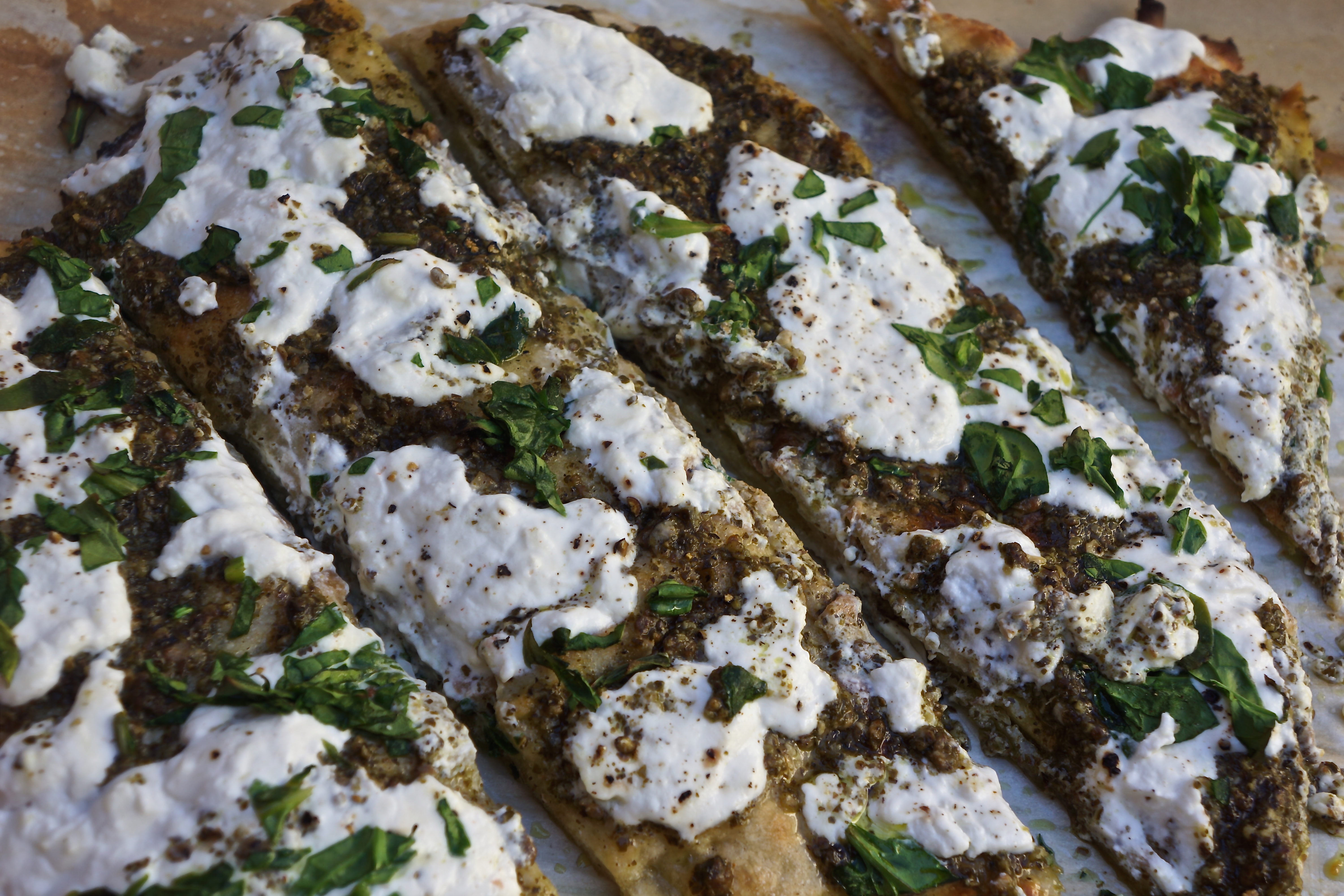 Bake until cheese is hot, melted and bubbly, and the edges of pizza are deep golden.