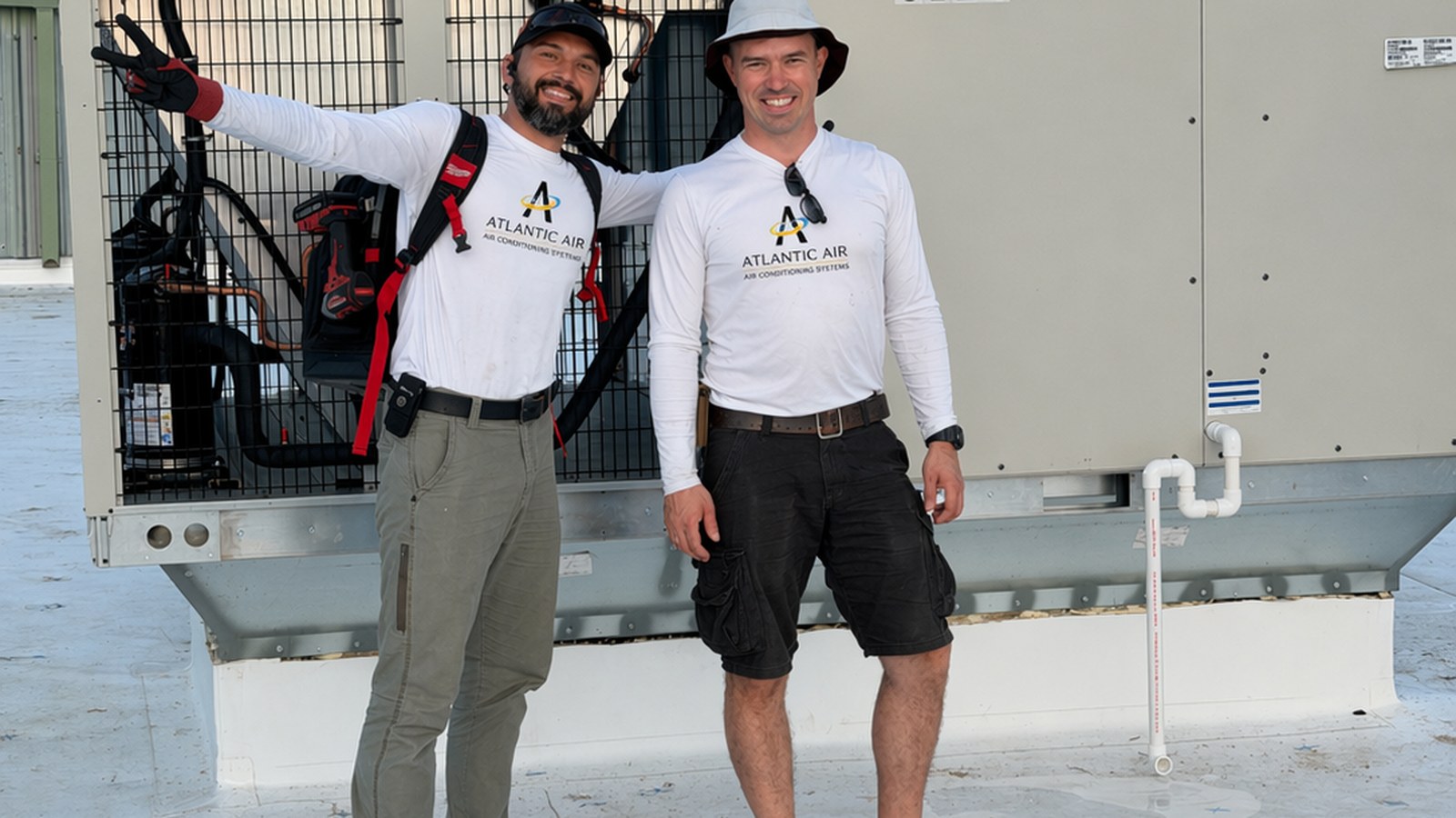AtlantFlow AC & HEAT technicians on Pompano Beach commercial rooftop HVAC installation